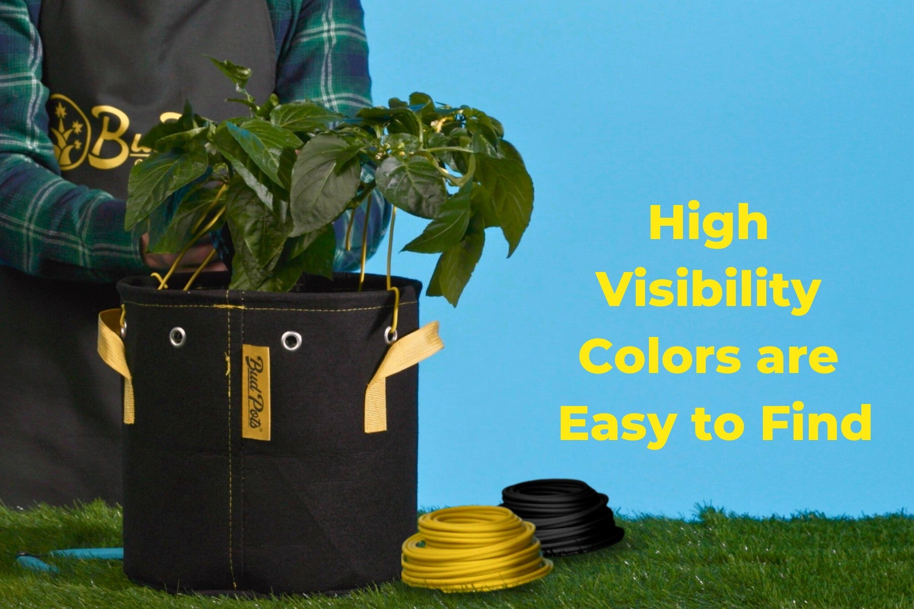 BudTrainer grow bag with yellow training wires, showing high-visibility colors for easy plant training identification.