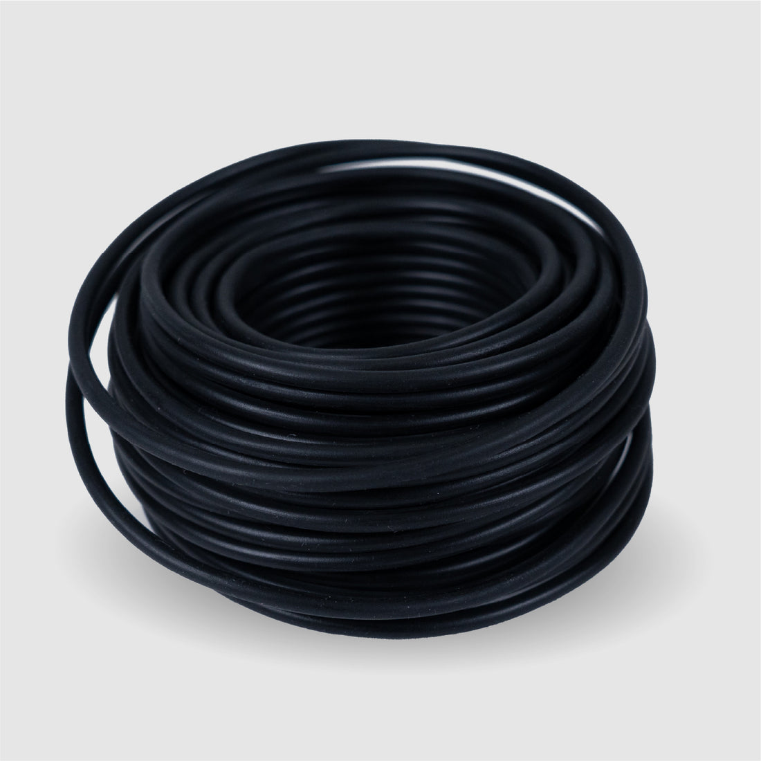 BudTrainer BudHuggers yellow plant training wire coil for cannabis branch bending and low-stress training.