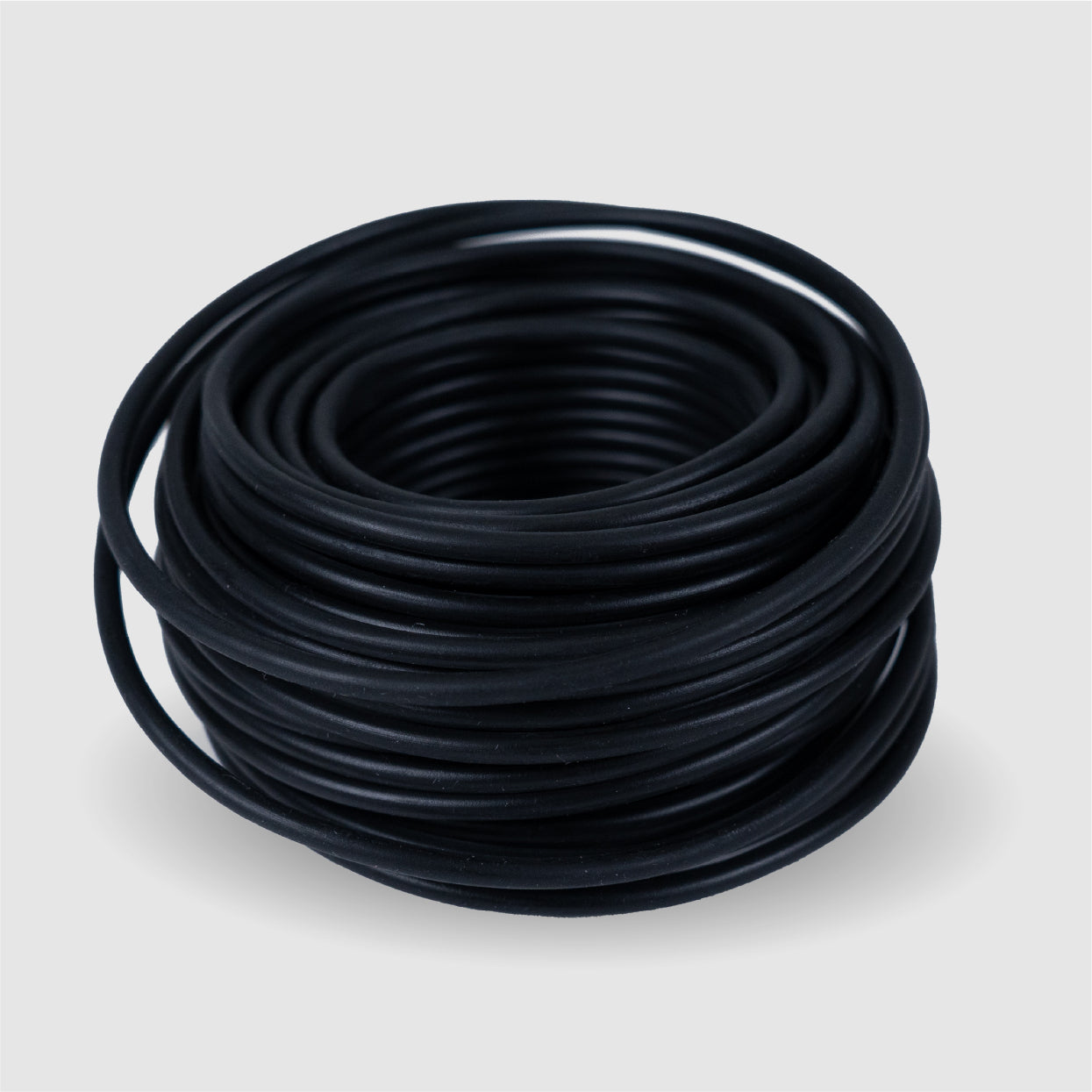 BudTrainer BudHuggers black plant training wire coil for low-stress cannabis branch support and bending.